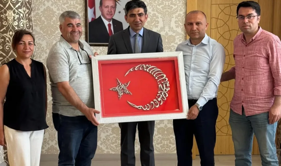 Yerköy Halk Eğitimi Merkezi yöneticileri, tayini çıkan Kaymakam Muharrem Coşgun’a