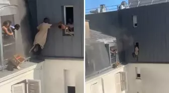 Paris'te bulunan bir apartmanın 6. katında çıkan yangında mahsur kalan