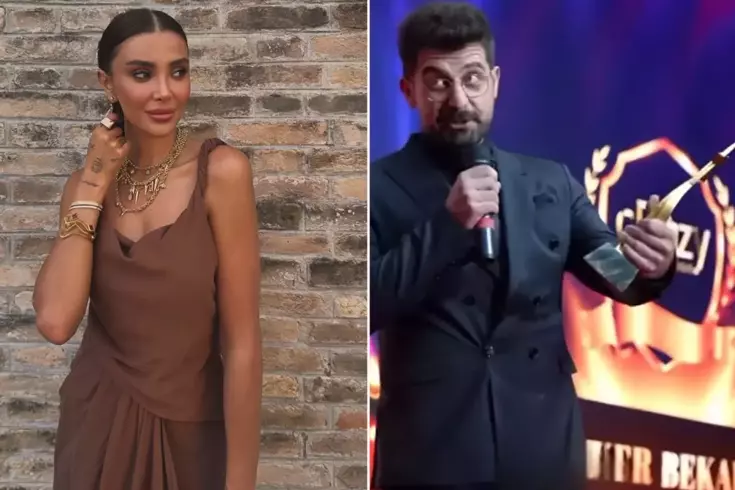 Özge Ulusoy, bir ödül töreninde sunuculuk yaptığı sırada iş insanı