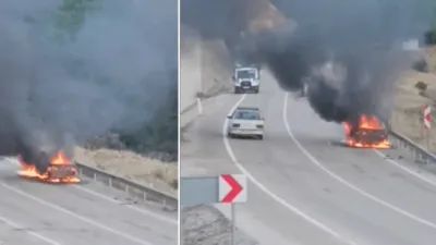 Kozan ilçesinde seyir halindeki bir otomobil, alev alarak yanmaya başladı.