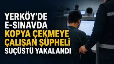 Yerköy E-Sınav Merkezi'nde düzenlenen sürücü kursu sınavında kopya çekmeye çalışan